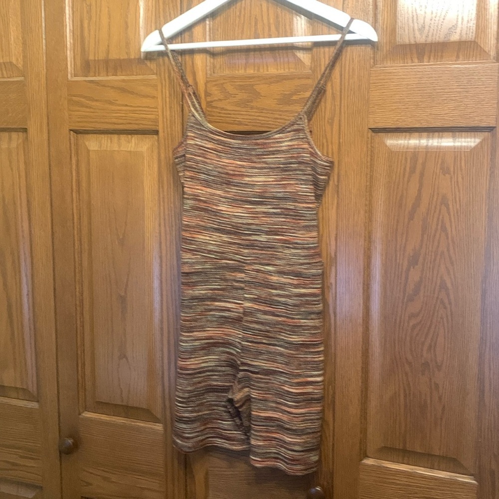 Ladies gently worn size Small jump suit, multi colored